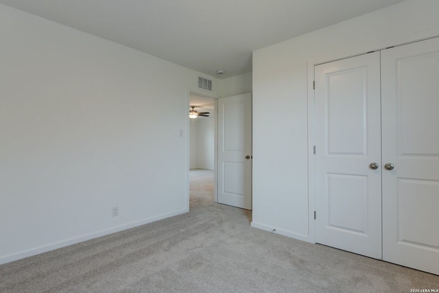 Spacious, unfurnished interior of a new home in Hennersby Hollow, San Antonio (Image 29).