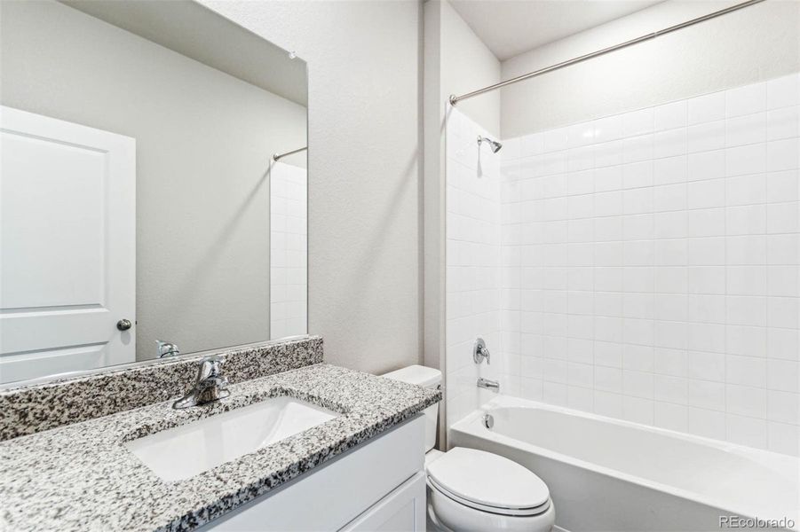 Furnished interior view inside a new home in Second Creek Farm, Commerce City (Image 5).