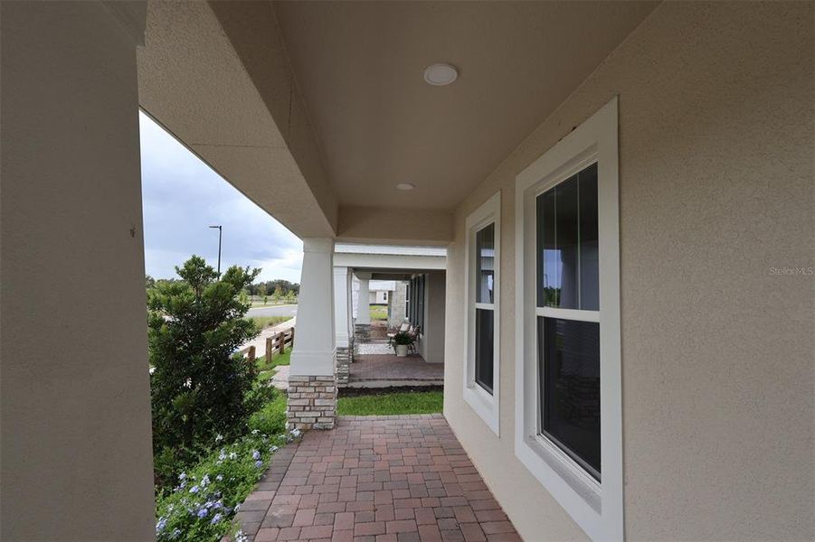 Exterior details and patio area of a home in Center Lake on the Park, St. Cloud (Image 28).