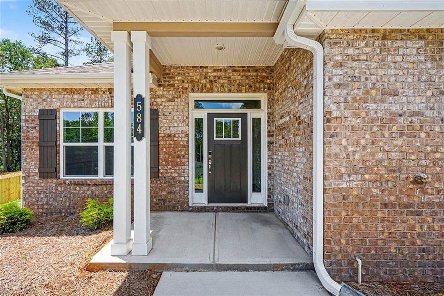 Exterior details and patio area of a home in The Fields of Walnut Creek, Pendergrass (Image 3). Exterior details and patio area of a home in The Fields of Walnut Creek, Pendergrass (Image 3).