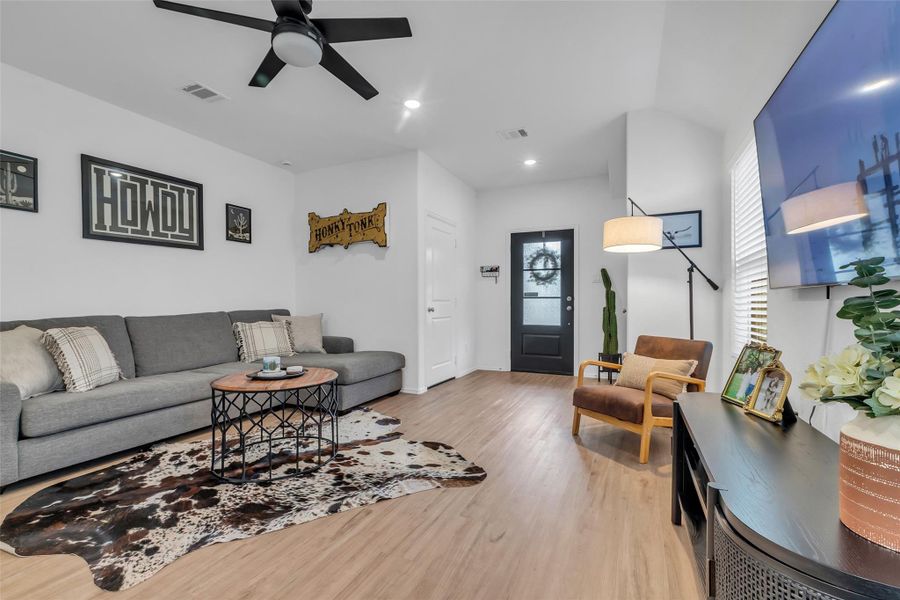 Here's a picture of the front door leading to the front porch and walkway. To the left of the front door is the door leading to the garage. Perfect for those rainy days.