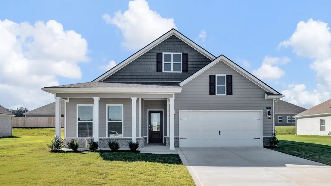 Front exterior of a new home in Riverwood Gardens, Oakland, TN, highlighting curb appeal (Image 2).