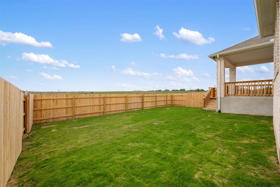 Exterior details and patio area of a home in Willow Springs, Buda (Image 17).