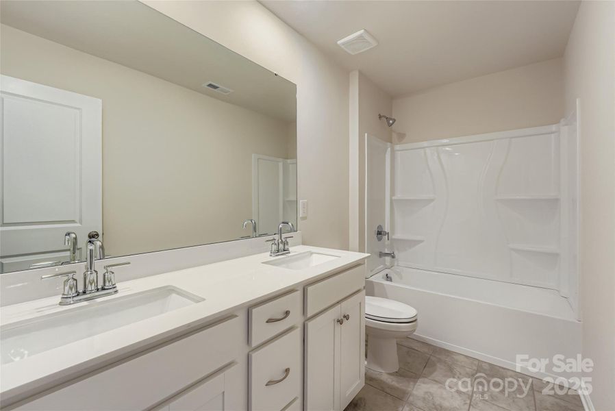 Furnished interior view inside a new home in Shannon Woods: Walk & Enclave, Maiden (Image 4). Furnished interior view inside a new home in Shannon Woods: Walk & Enclave, Maiden (Image 4).