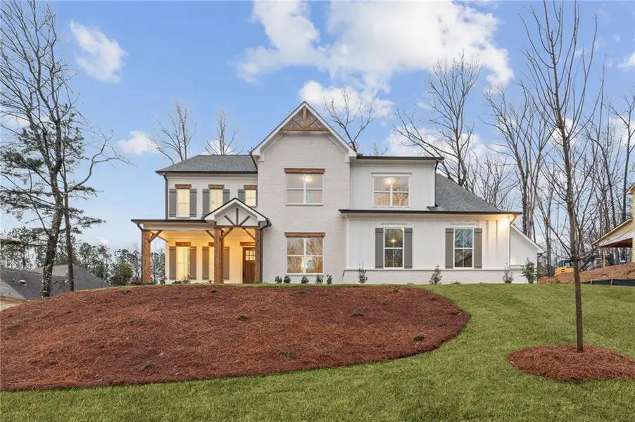Front exterior of a new home in The Reserve at Knollwood, Canton, GA, highlighting curb appeal (Image 18).