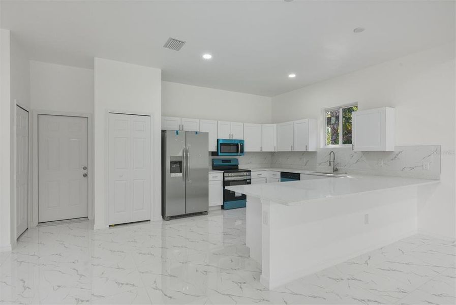 Furnished interior view inside a new home in , Punta Gorda (Image 13). Furnished interior view inside a new home in , Punta Gorda (Image 13).