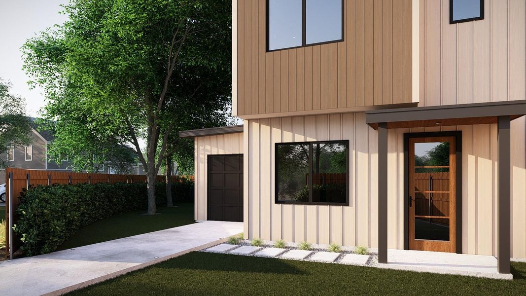 Doorway to property featuring board and batten siding