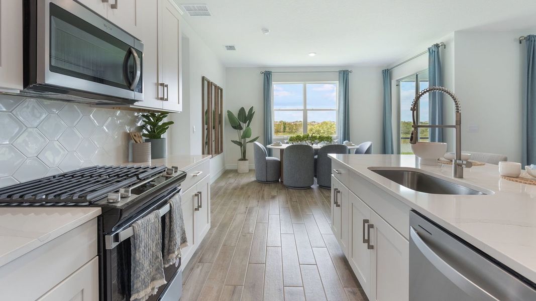 Representative furnished interior of a home built from the DENHAM by D.R. Horton in Lakes of Mount Dora, Mount Dora (Image 14).