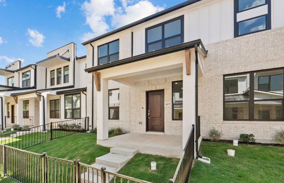 Exterior details and patio area of a home in Monarch on Main, Round Rock (Image 3). Exterior details and patio area of a home in Monarch on Main, Round Rock (Image 3).