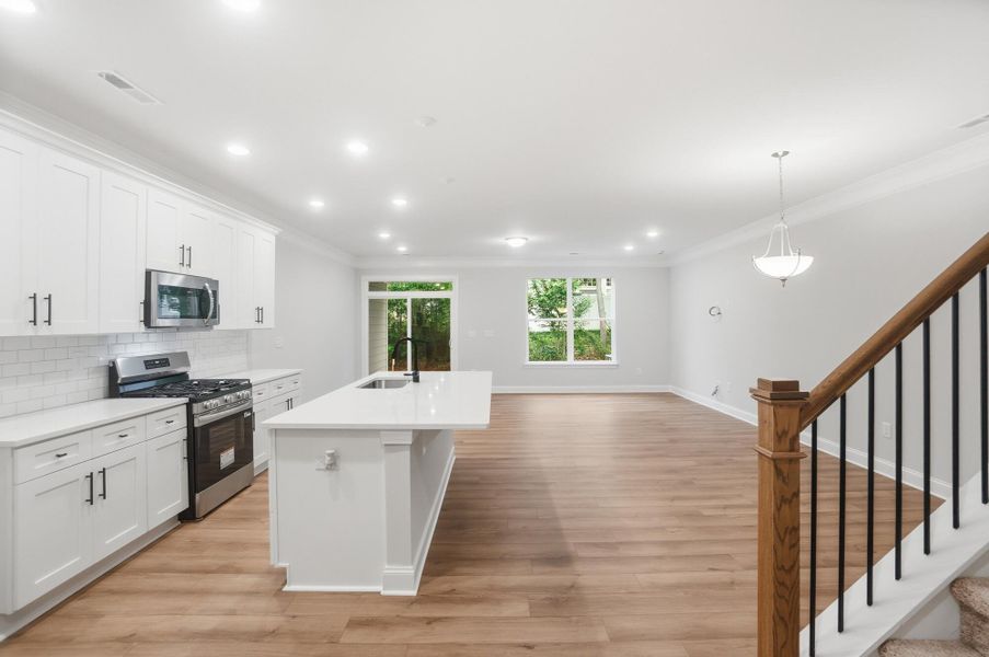 Furnished interior view inside a new home in Harrisburg Village Townhomes, Harrisburg (Image 7).
