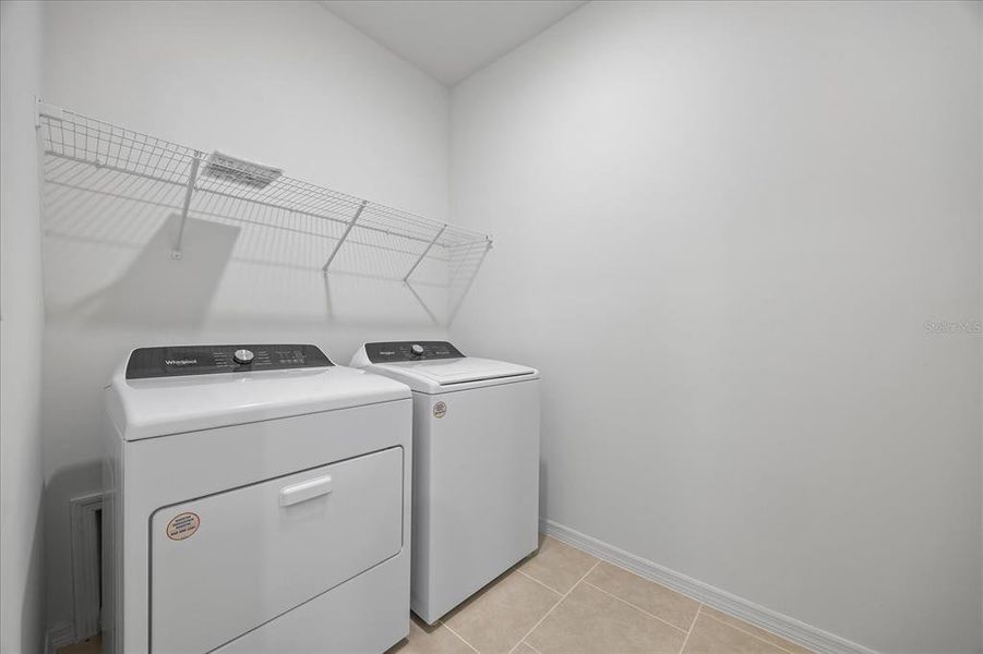 Furnished interior view inside a new home in , Punta Gorda (Image 13).