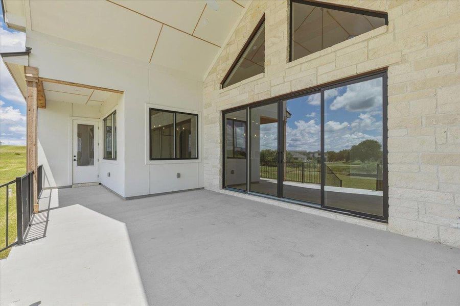 The covered back patio is the perfect place to relax and enjoy after a round of golf or a day on the lake. The covered back patio is the perfect place to relax and enjoy after a round of golf or a day on the lake.