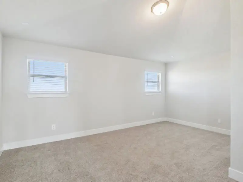 Spacious, unfurnished interior of a new home in Legendary Trails - Premier Series, Cibolo (Image 28).