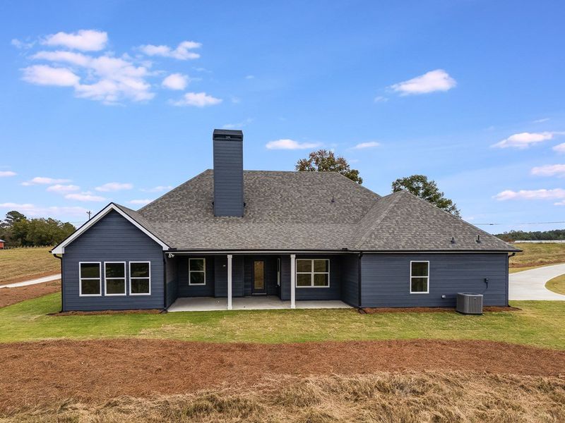 Exterior details and patio area of a home in Parmer Farms, Roopville (Image 4).