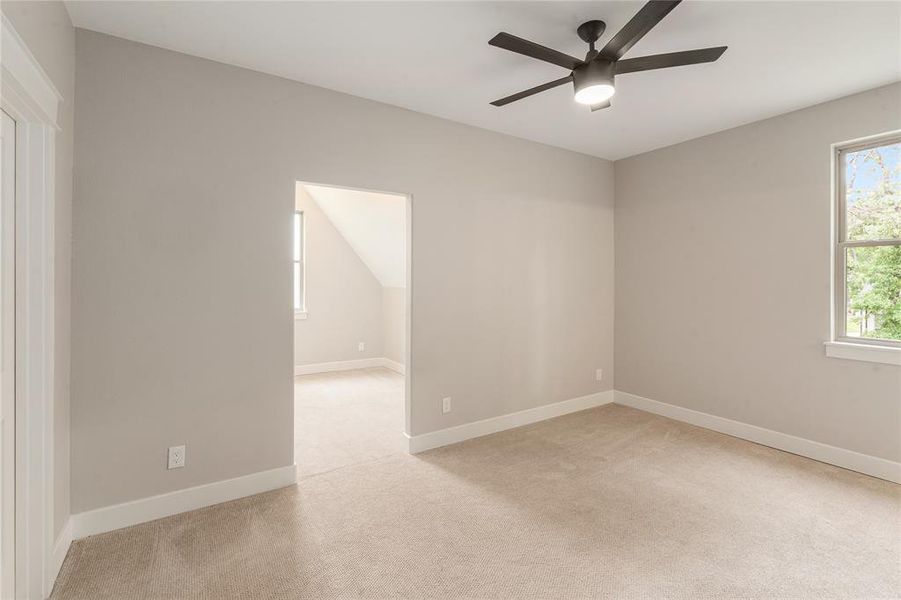 Bedroom showing opening into bonus room Bedroom showing opening into bonus room