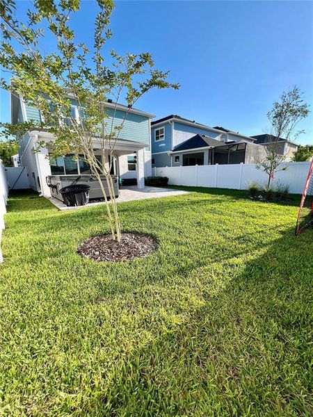 Exterior details and patio area of a home in Persimmon Park - Garden Series, Wesley Chapel (Image 21). Exterior details and patio area of a home in Persimmon Park - Garden Series, Wesley Chapel (Image 21).