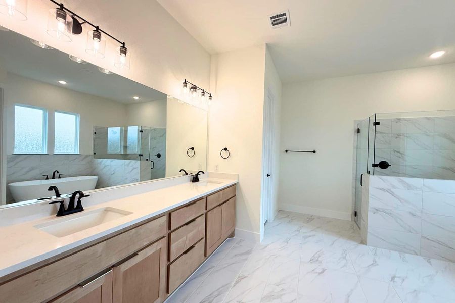 Furnished interior view inside a new home in Heights at San Gabriel, Georgetown (Image 8).
