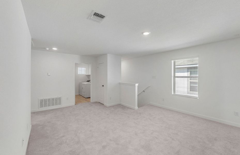 Spacious, unfurnished interior of a new home in Sunfield, Buda (Image 17). Spacious, unfurnished interior of a new home in Sunfield, Buda (Image 17).