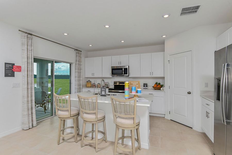 Representative furnished interior of a home built from the Cypress by Taylor Morrison in Waterstone, Groveland (Image 4).