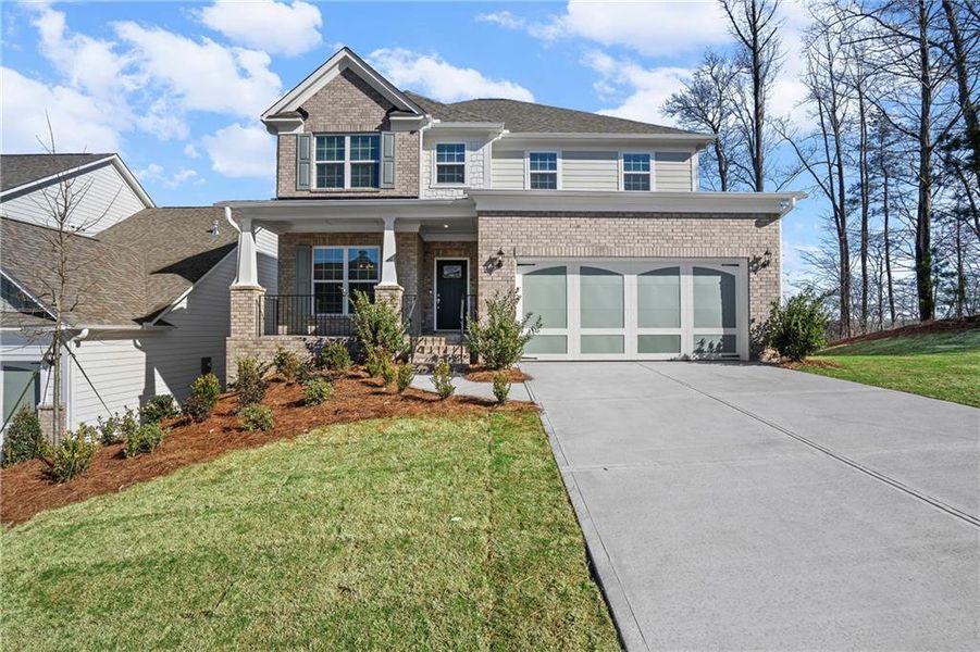 Front exterior of a new home in Sierra Creek, Hoschton, GA, highlighting curb appeal (Image 32).