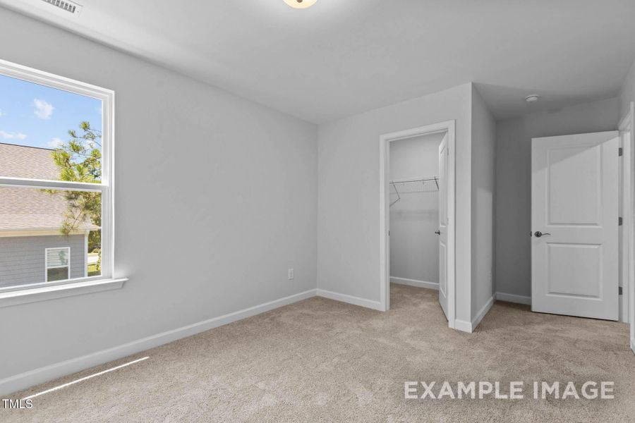 Spacious, unfurnished interior of a new home in Tobacco Road, Angier (Image 25).