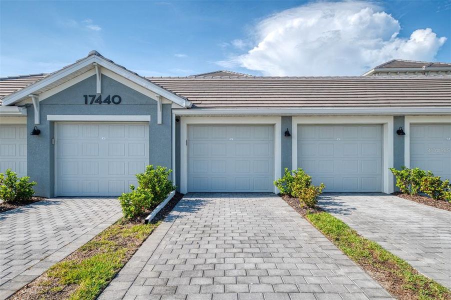 Front exterior of a new home in , Venice, FL, highlighting curb appeal (Image 22). Front exterior of a new home in , Venice, FL, highlighting curb appeal (Image 22).
