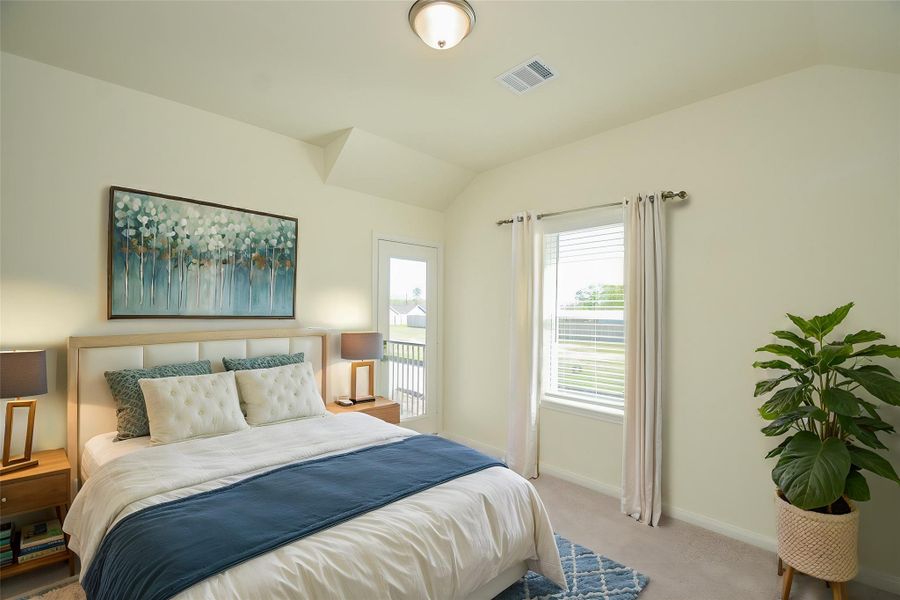 Notice the door that leads to a beautiful patio right outside the bedroom.