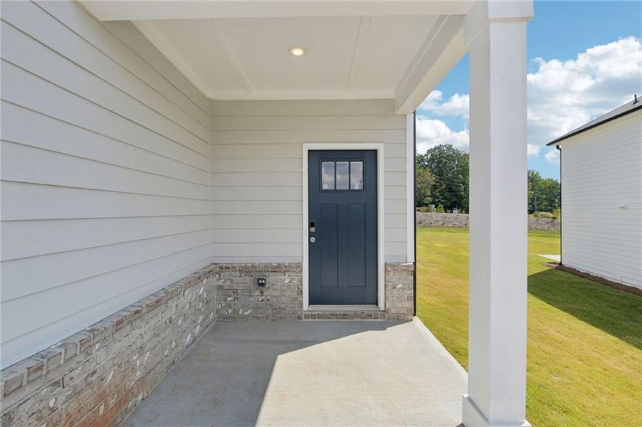 Exterior details and patio area of a home in Avalon - Reserve Series, Conyers (Image 2).