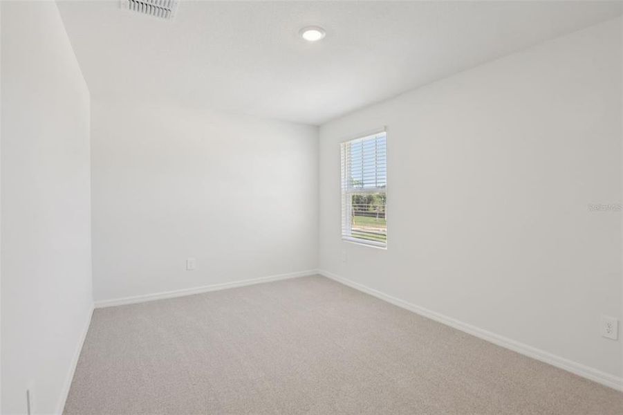 Spacious, unfurnished interior of a new home in Hilltop Vistas, Dade City (Image 34).