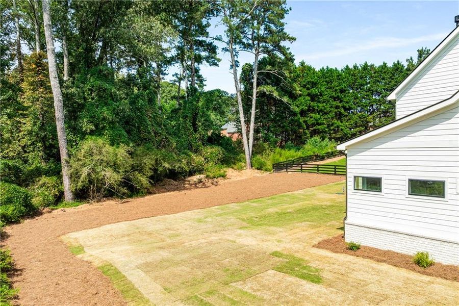 Front exterior of a new home in , Alpharetta, GA, highlighting curb appeal (Image 23). Front exterior of a new home in , Alpharetta, GA, highlighting curb appeal (Image 23).