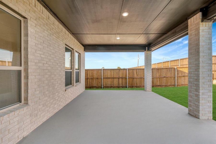 Exterior details and patio area of a home in Sterling Greene, Arlington (Image 24). Exterior details and patio area of a home in Sterling Greene, Arlington (Image 24).