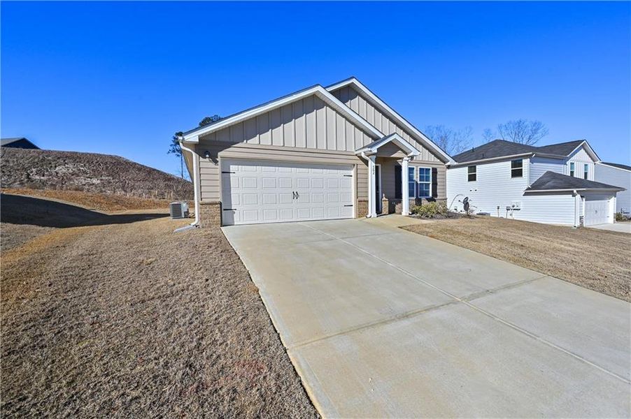 Front exterior of a new home in Kingston Park, Kingston, GA, highlighting curb appeal (Image 21).