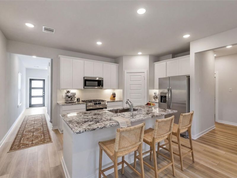 Furnished interior view inside a new home in Caney Creek Place, Conroe (Image 16).