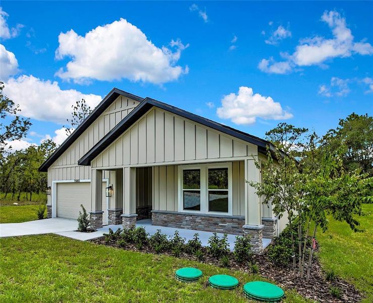 Front exterior of a new home in , Brooksville, FL, highlighting curb appeal (Image 26).
