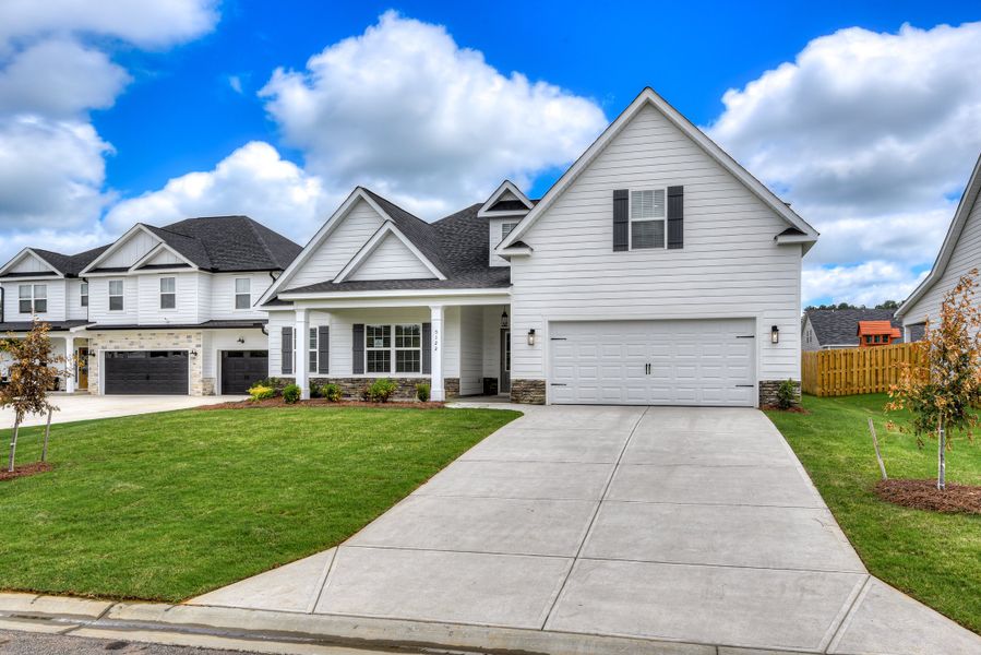 Front exterior of a new home in The Sanctuary, Aiken, SC, highlighting curb appeal (Image 20). Front exterior of a new home in The Sanctuary, Aiken, SC, highlighting curb appeal (Image 20).