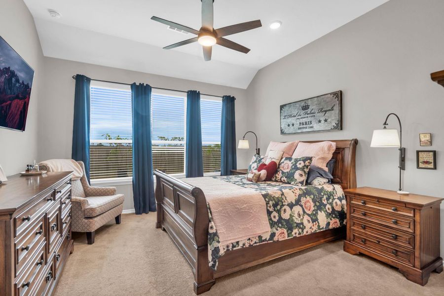 This primary bedroom is perfect. Lots of natural light. Raised ceiling and new/upgraded cieling fan. This primary bedroom is perfect. Lots of natural light. Raised ceiling and new/upgraded cieling fan.