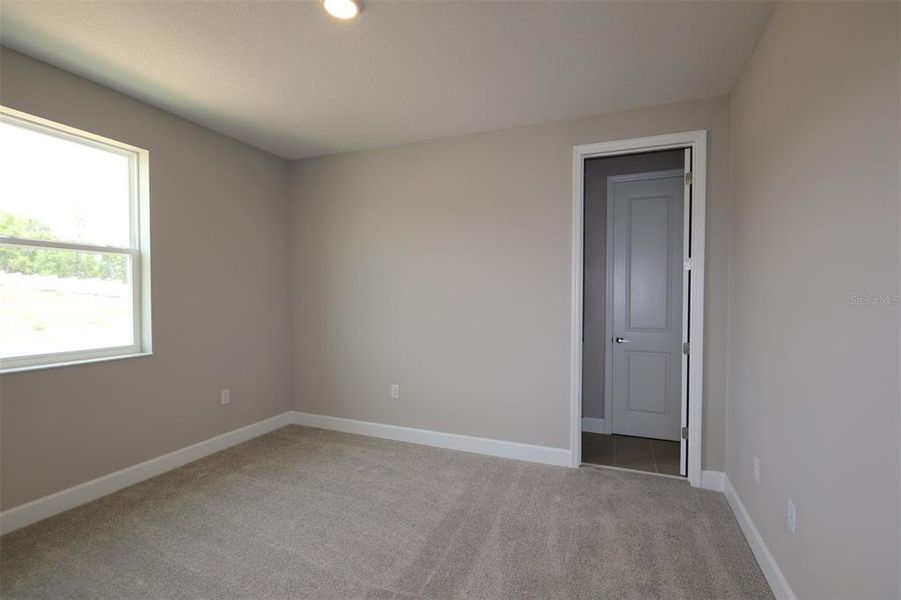 Spacious, unfurnished interior of a new home in Wolf Lake Ranch, Apopka (Image 9).