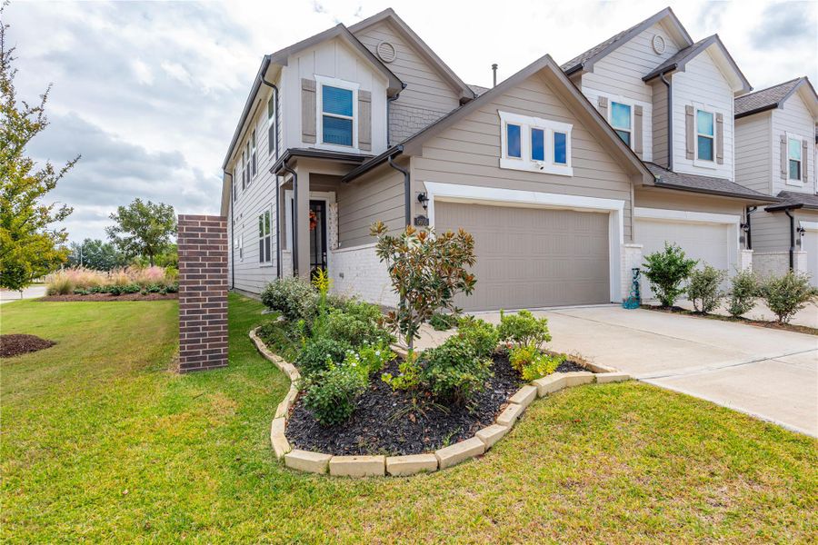 Front exterior of a new home in , Pasadena, TX, highlighting curb appeal (Image 2).