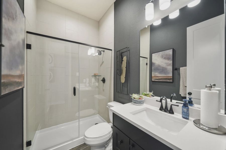 Representative furnished interior of a home built from the Montgomery by Chesmar Homes in Meridiana 50's and 60's, Manvel (Image 8).