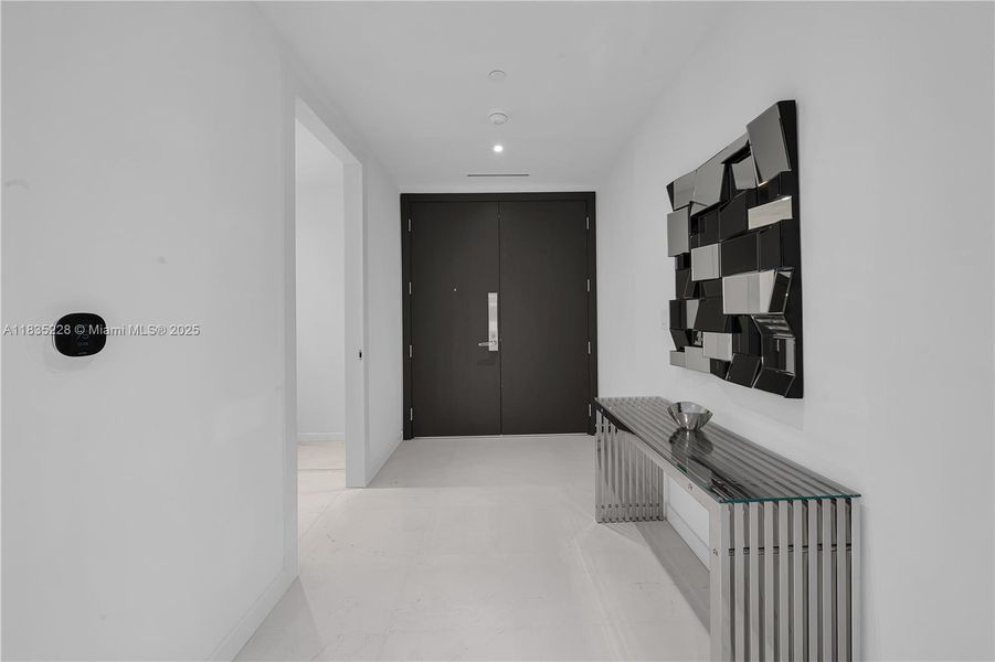 Spacious, unfurnished interior of a new home in Aston Martin Residences, Miami (Image 21).