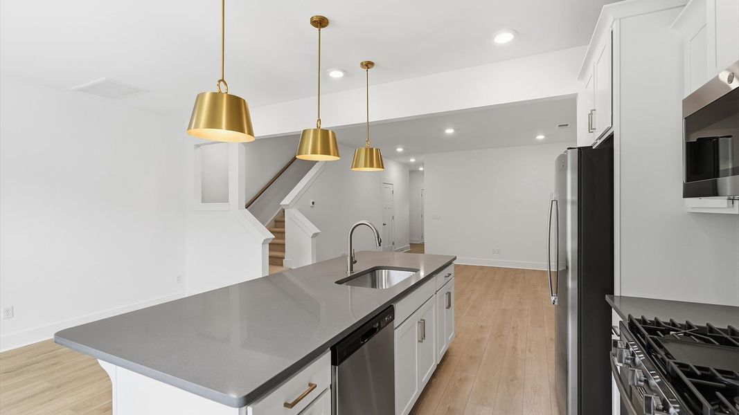 Stunning kitchen centerpiece designed to elevate both entertaining and everyday living by DRB Homes Stunning kitchen centerpiece designed to elevate both entertaining and everyday living by DRB Homes
