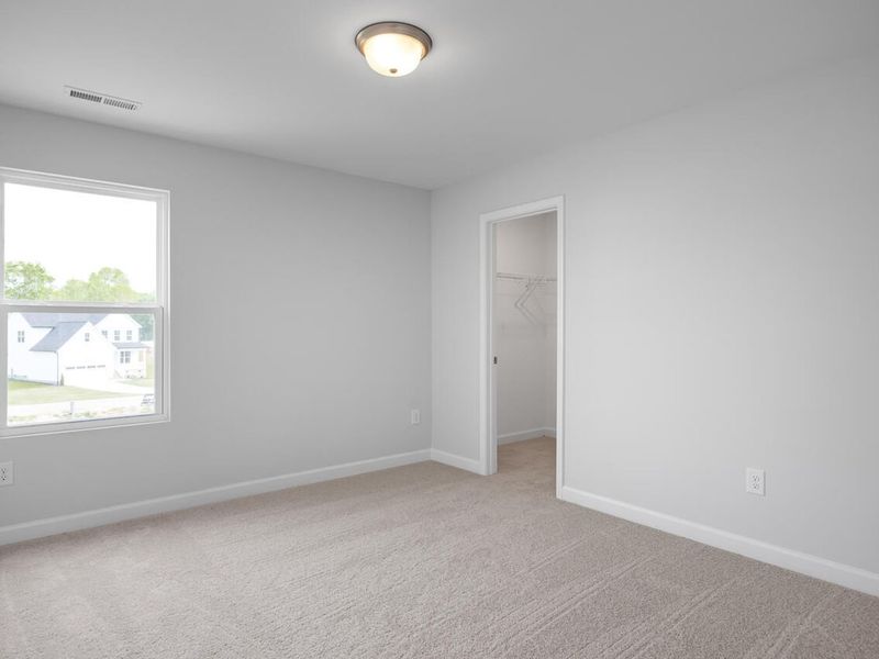Spacious, unfurnished interior of a new home in Woodland Crossing, Zebulon (Image 20).