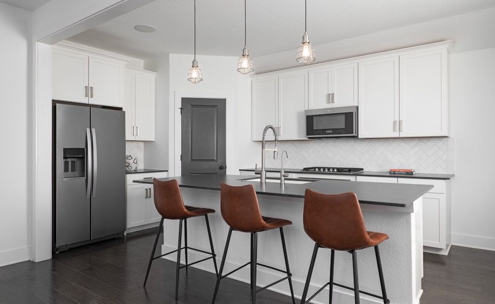 Representative furnished interior of a home built from the Manchester II by Ashton Woods in Willow Springs, Buda (Image 5).