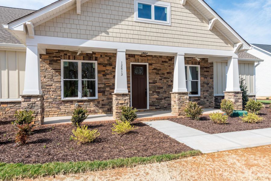 Exterior details and patio area of a home in Bailey's Glen, Huntersville (Image 21).