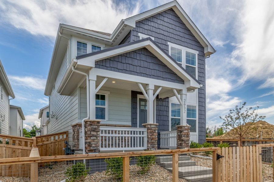 Front exterior of a new home in Arras Park, Thornton, CO, highlighting curb appeal (Image 22).