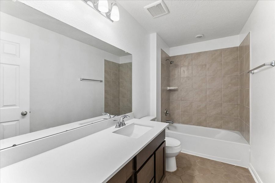 Furnished interior view inside a new home in Grace Landing, Willis (Image 10). Furnished interior view inside a new home in Grace Landing, Willis (Image 10).