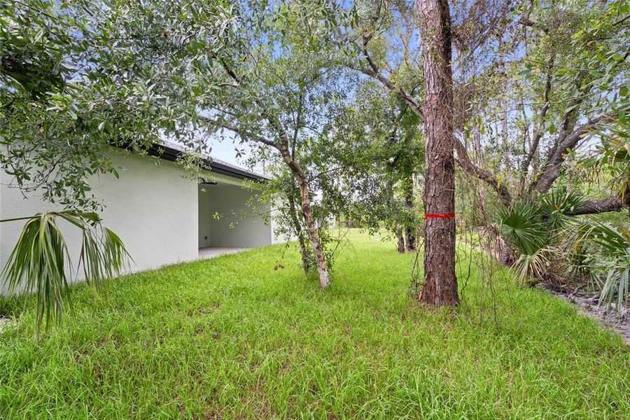 Front exterior of a new home in , North Port, FL, highlighting curb appeal (Image 2).