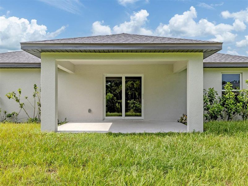 Exterior details and patio area of a home in , Port Charlotte (Image 25).