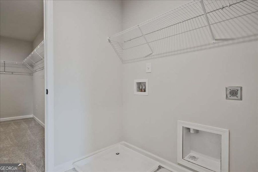 Spacious, unfurnished interior of a new home in The Paddocks at Doc Hughes, Buford (Image 32).