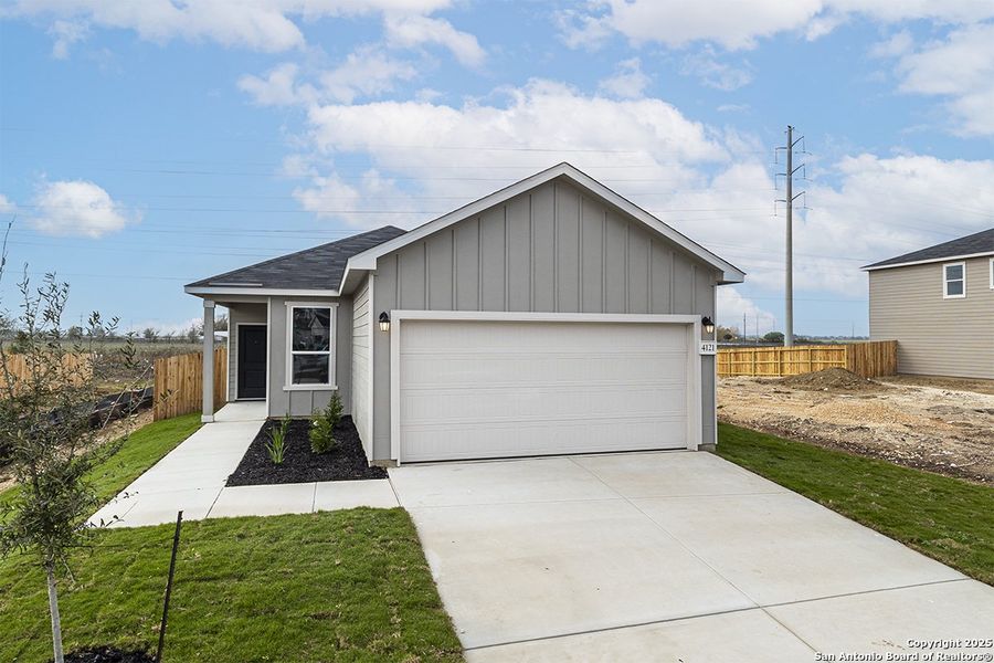 Front exterior of a new home in Woodside Farms, Seguin, TX, highlighting curb appeal (Image 1). Front exterior of a new home in Woodside Farms, Seguin, TX, highlighting curb appeal (Image 1).